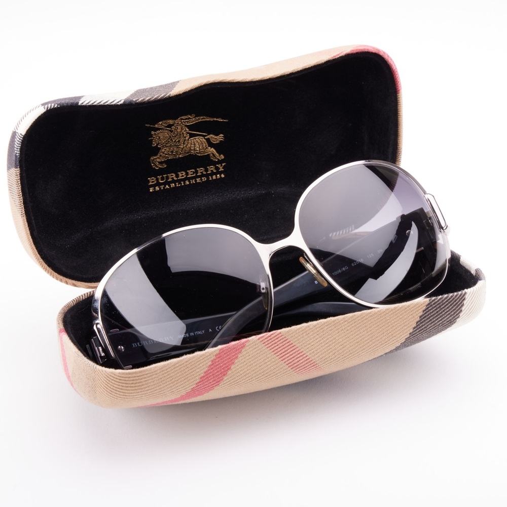 Authentic Burberry sunglasses with case.